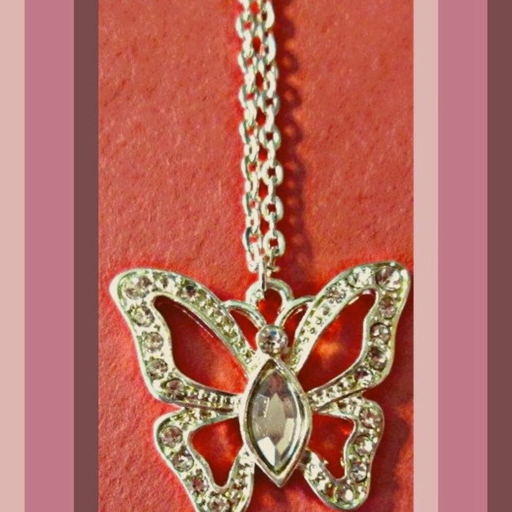 Silver In Color Butterfly Design Necklace With Clear Crystals